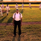 James Earl Jones stands in front of baseball players and a baseball field in Field of Dreams.